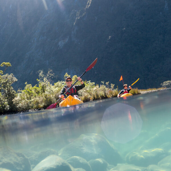 Kayaking-in-crystal-clear-water-screen, Milford Sound, New Zealand